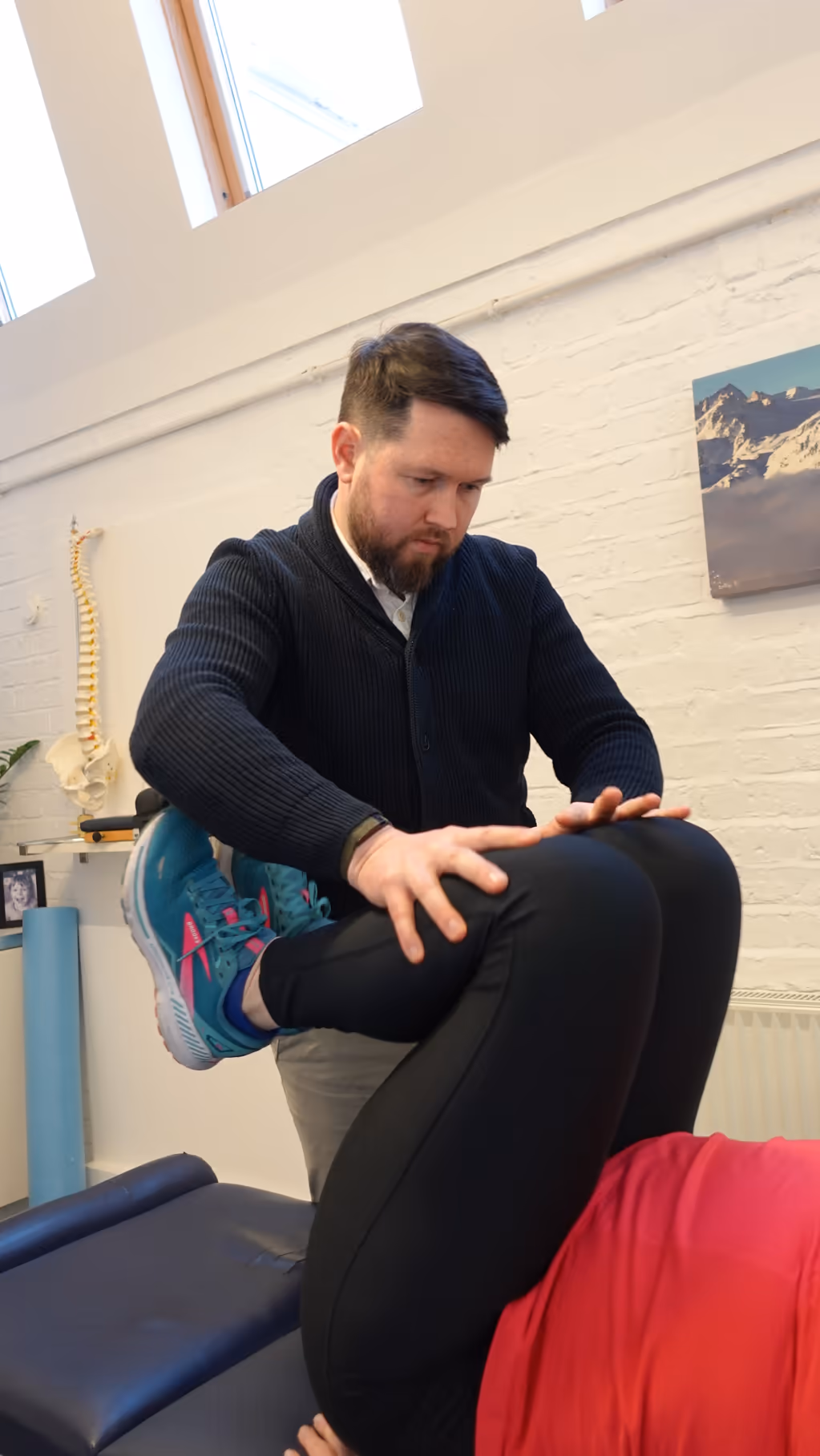 Chiropractor treating a pregnant patient at Putney Chiropractic Centre